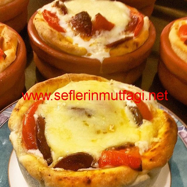 Güveçte sucuklu yumurta tarifi-Güveçte sucuk tarifi